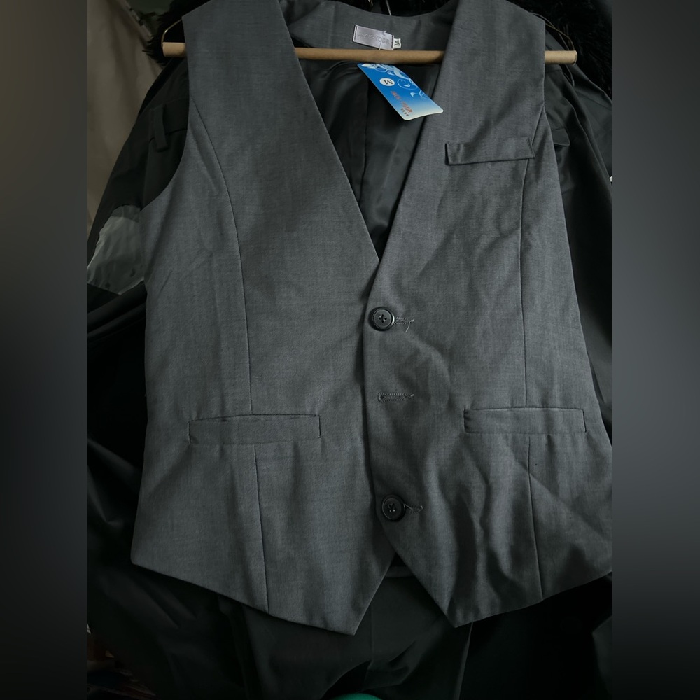 Grey suit pants and vest.